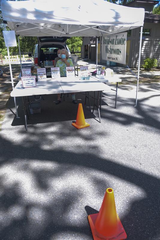 Cones demonstrate the proper distance to maintain between customers.